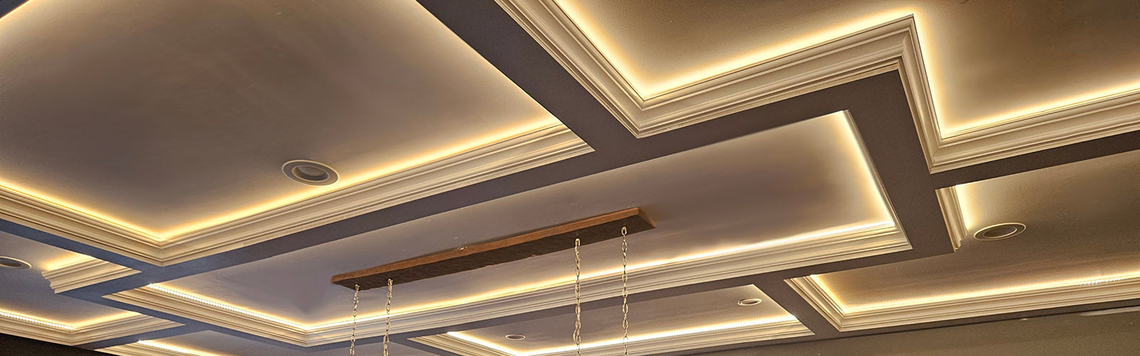 Beautiful backlit coffered ceiling made with  peel and stick Easy Crown Molding.